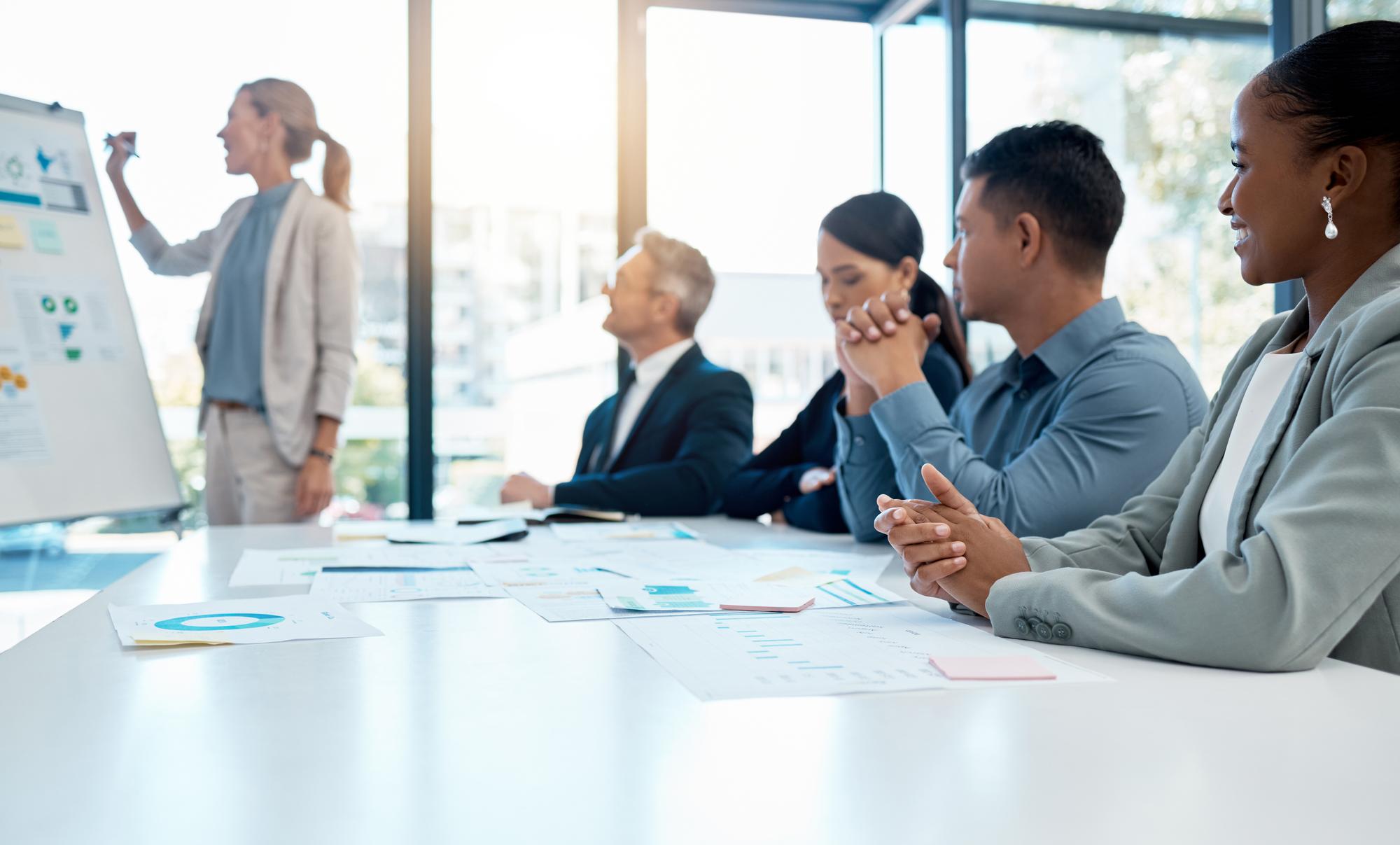 Strategic business consulting experts collaborating on market expansion plans in Malaysia